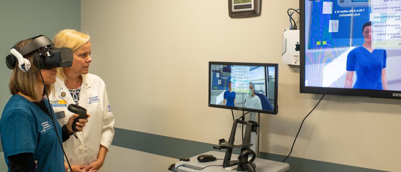 A student uses the virtual reality patient simulator